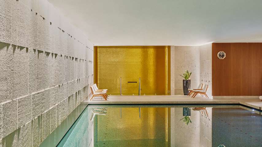 The gold-tiled pool at Bvlgari Spa London