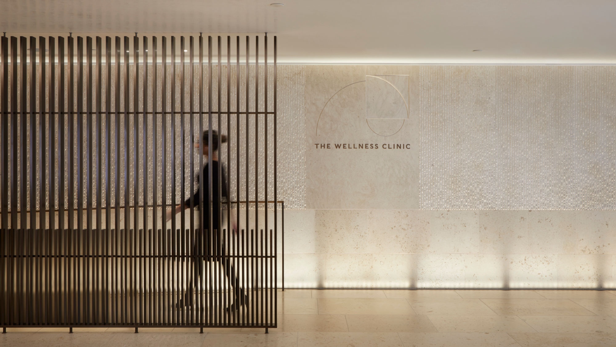 The Wellness Clinic at Harrods — stone and bronze interior